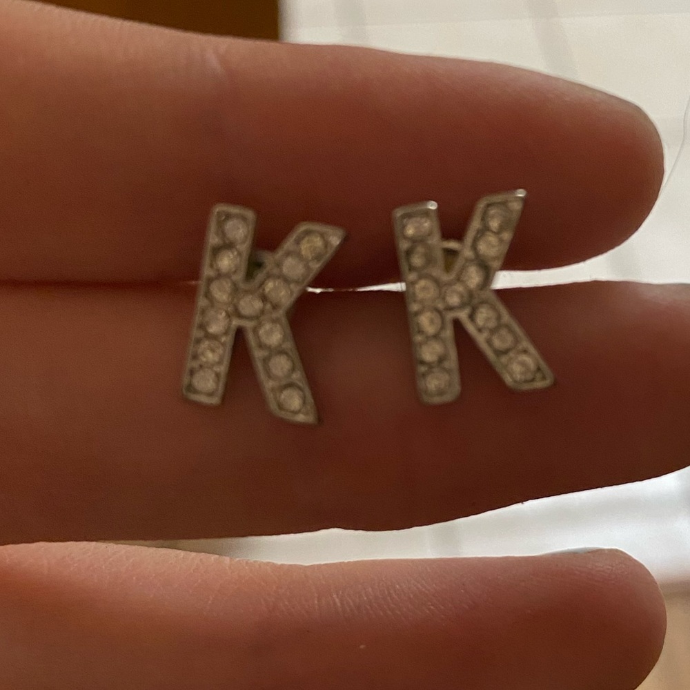large “K” earrings